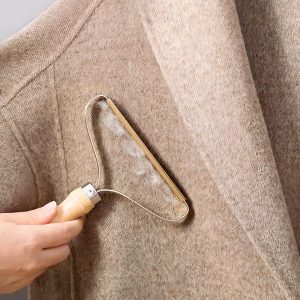 Brosse manuelle anti-poils en acier inoxydable pour blousons