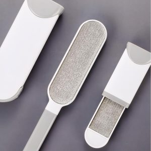 Brosse magique anti-peluches et anti-poils en plastique