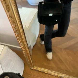 Sac Claudie Pierlot en daim noir franges