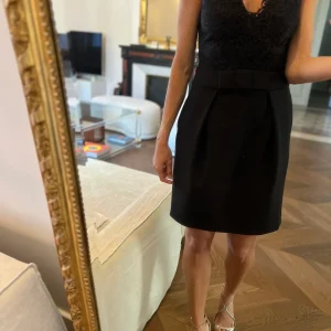 Robe Claudie Pierlot haut en dentelle noire et noeud