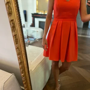 Robe Claudie Pierlot rouge Rencontre avec noeud