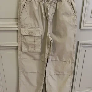 Lucie Gabossi -Tape à l'oeil Pantalon Neuf beige T.12 ans