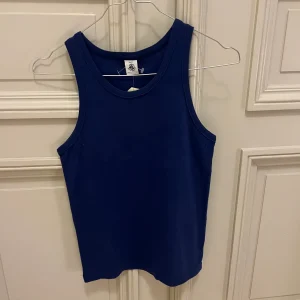 Lucie Gabossi -Petit Bateau débardeur bleu électrique T.14 ans