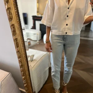 Zara - Chemise blanche courte boutons noirs