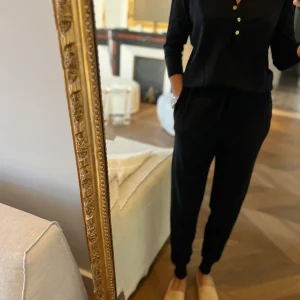 Combinaison Sandro noire boutons dorés