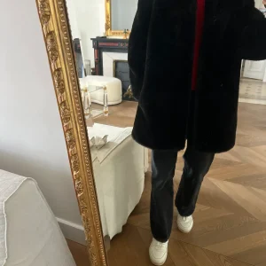 Manteau Sandro noir fausse fourrure