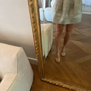 Anne Charlotte Jupe dorée patineuse