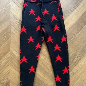 Malika Menard Pantalon Heimstone en laine étoiles rouges