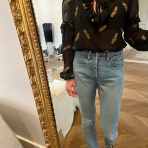 Blouse The Kooples noire plumes dorées