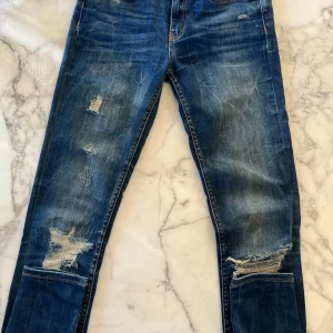 Charlotte Pirroni Jean slim fit Zara troué bleu brut