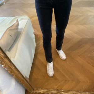 Pantalon Maje noir effet délavé