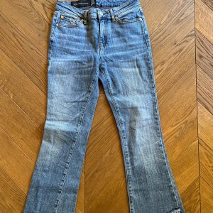 Jean Armani bleu clair bas large