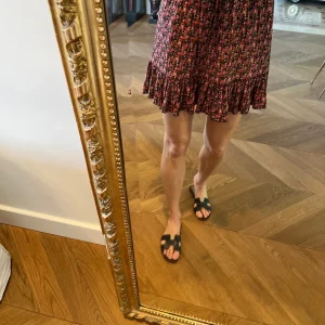 Jupe plissée à fleurs Zara