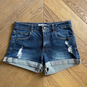 Short en jean Pull and Bear déchiré