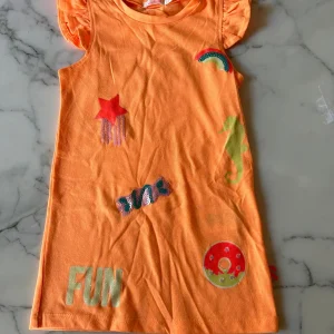 T-shirt orange fluo avec dessins 2 ans